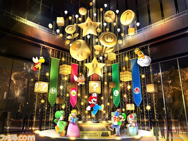 『スーパーマリオ』の豪華なオブジェを展開するコラボ企画が東京・丸の内エリアにて本日（11/14）開催。マリオがハテナブロックを叩く高さ約13mの巨大オブジェは圧巻