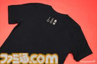 『バックショットルーレット』ディーラーがデザインされた“運が悪いなTシャツ”が登場。同時発売のピンバッジもクールなデザイン