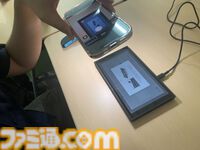 野澤さんがスマホのAI機能で読み上げをしているところ