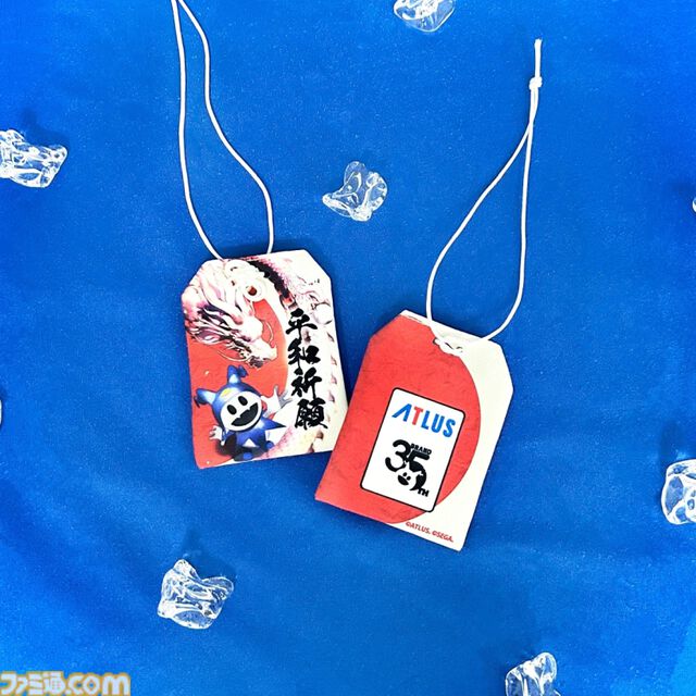アトラスフェス開催記念グッズの事後受注が本日（6/21）より再スタート。ジャックフロストのお守り＆Tシャツがかわいい