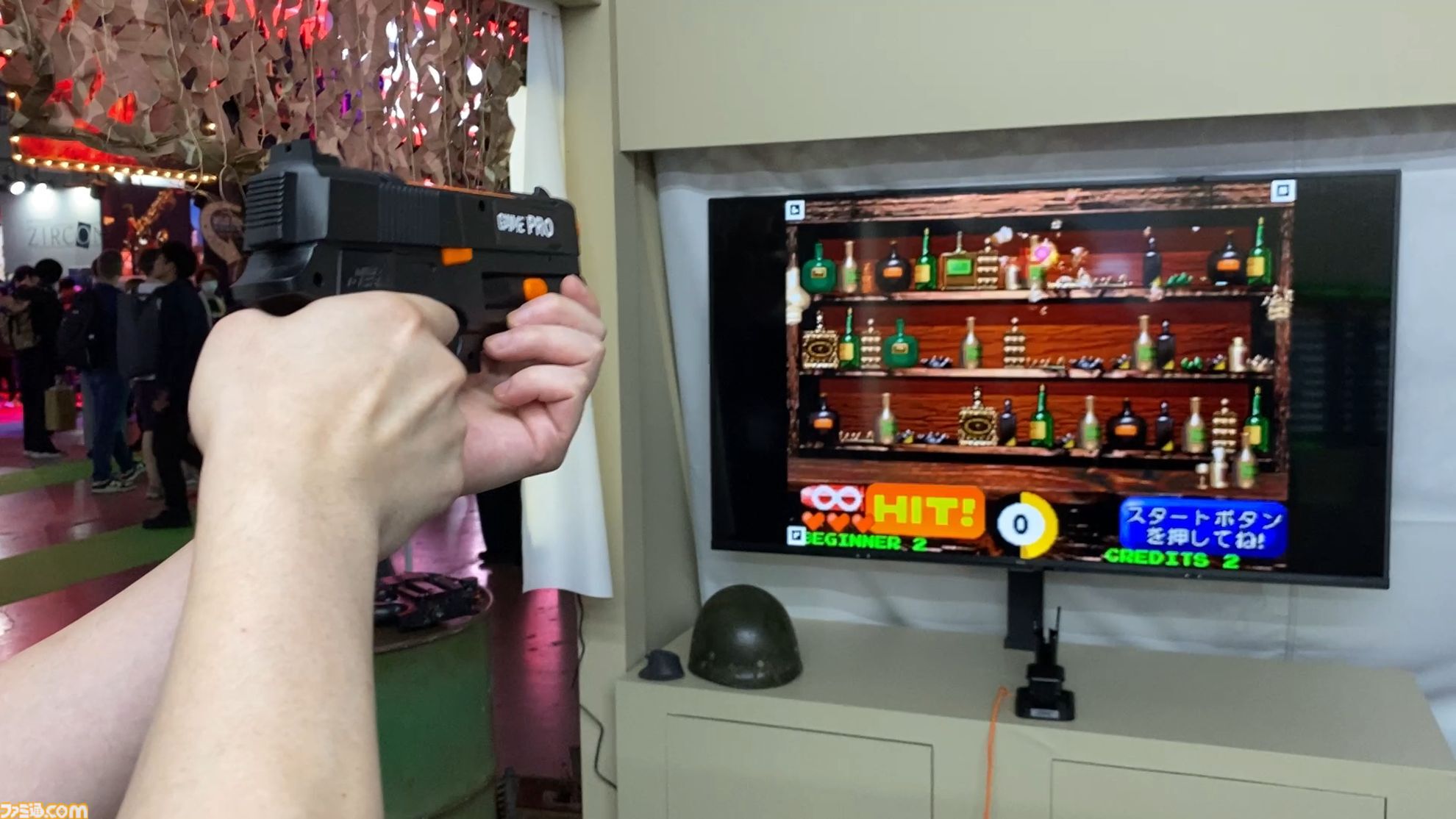 達成電器ブースの新型“G'AIM'E（ジーエイム）”の技術デモを試遊。LITEとPROの2種類で幅広い層に向けていく。汎用ガンコンの開発で令和のガンシューブーム到来が見えた【TGS2026】